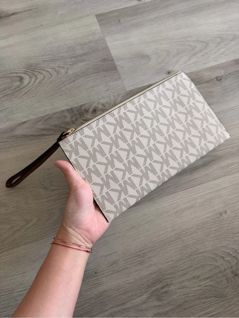 Michael Kors Cream Logo Wristlet Clutch with Gold Hardware